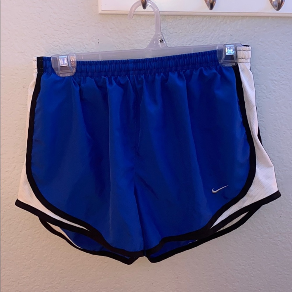 Blue Nike running shorts